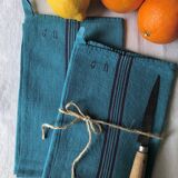 Antique clothes in linen and caribbean blue cotton