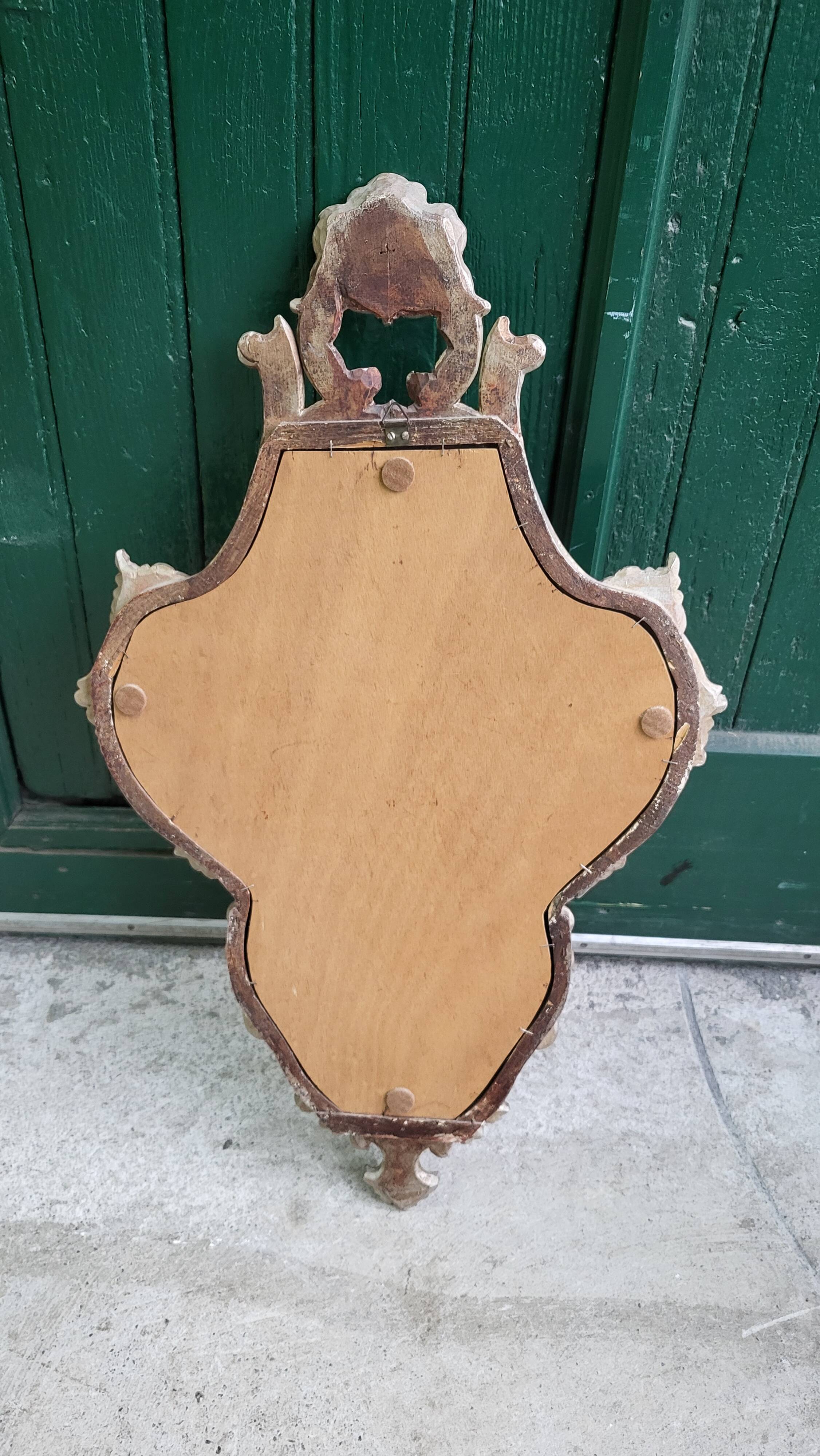 MIRROR IN LOUIS XV STYLE WITH GILDING AND SILVERING