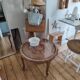 Vintage coffee table from the 1960s – Rattan top with a sunburst pattern