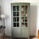 Art Deco library in earthy green