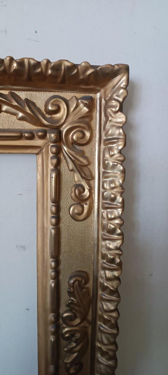 Miroir ancien en bois doré