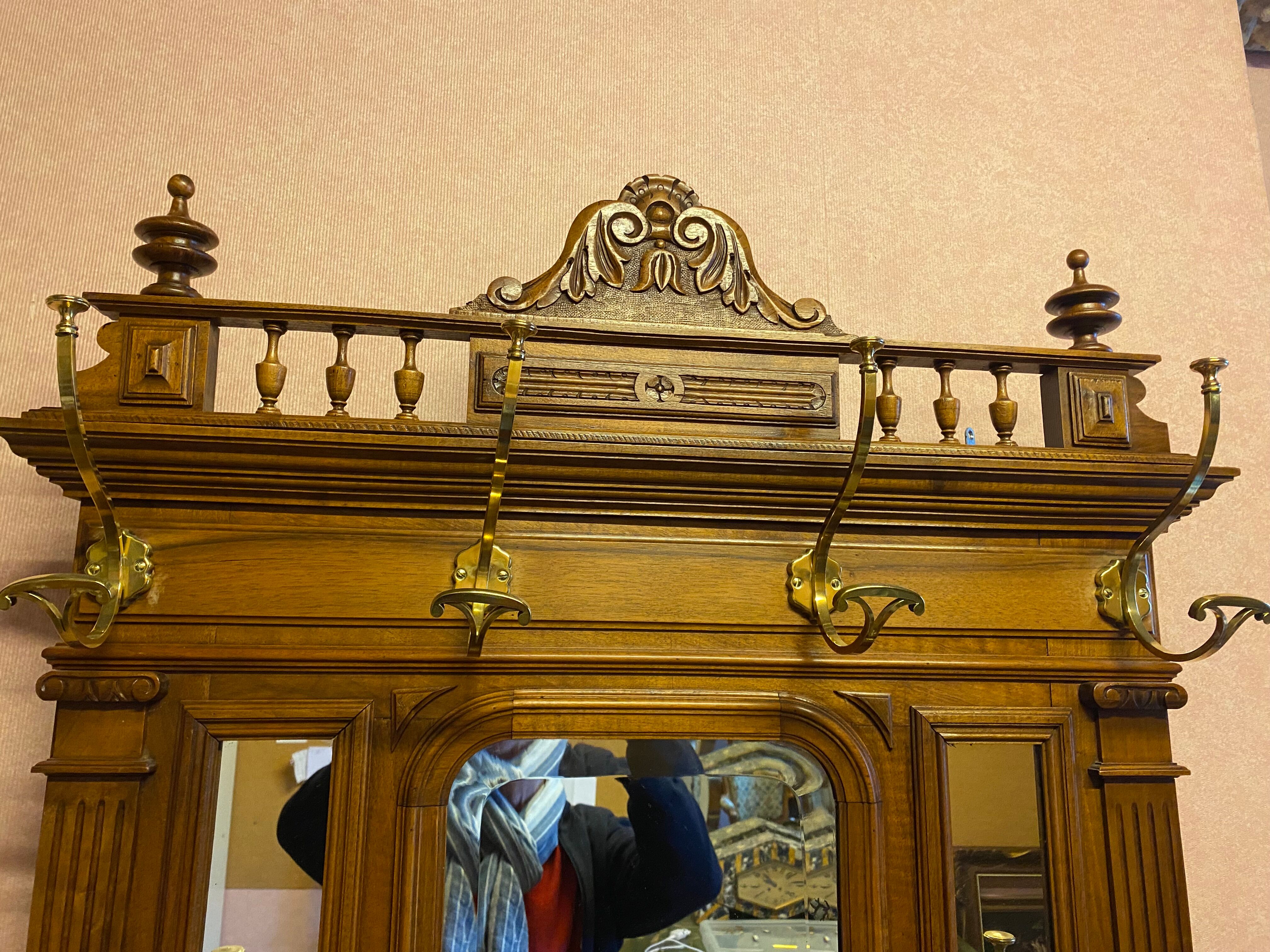 Walnut coat rack and brass hooks
