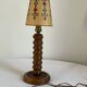 Vintage turned wooden lamp, in the style of Charles Dudouyt.