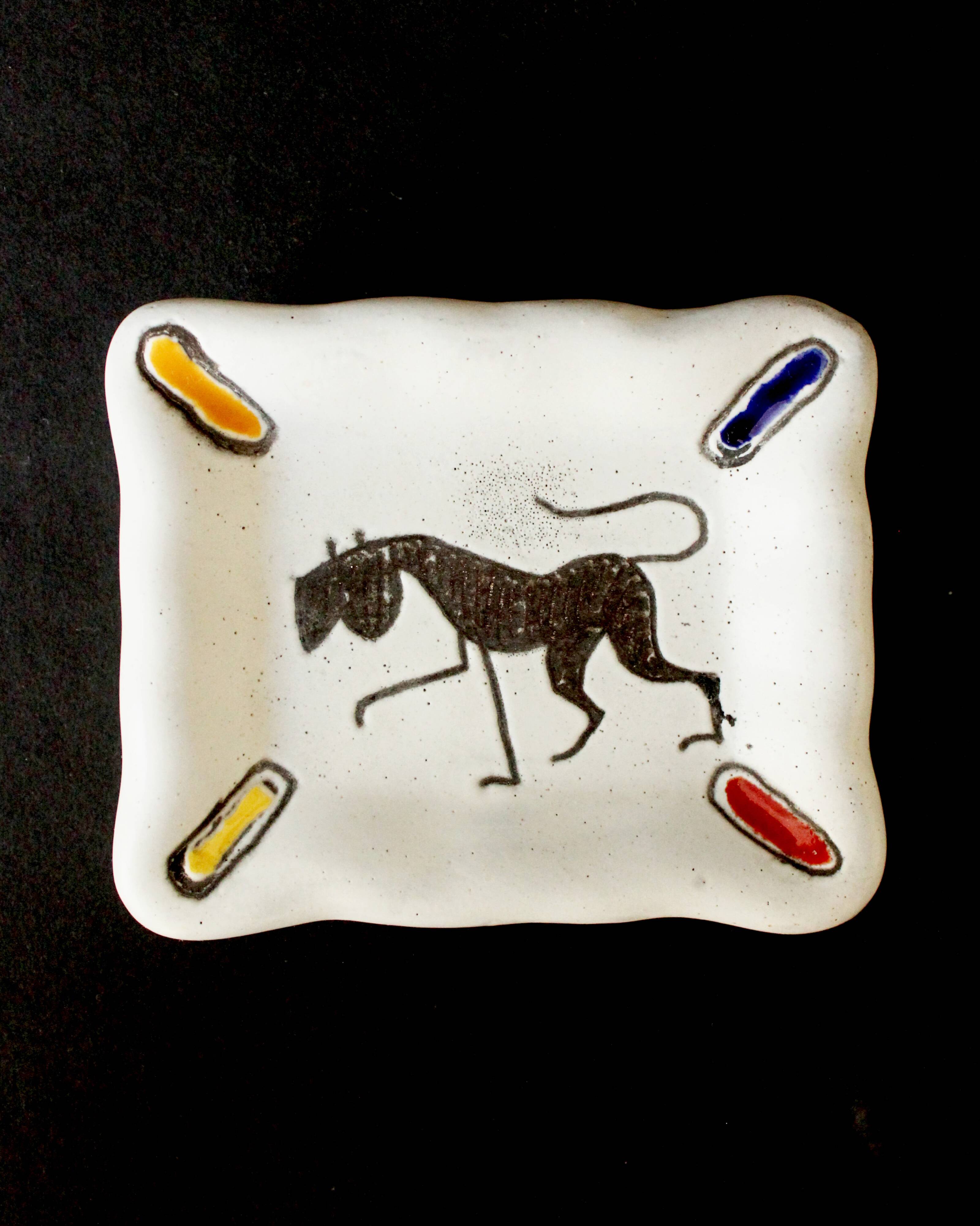 Small white and polychrome glazed ceramic ashtray, 1950s.