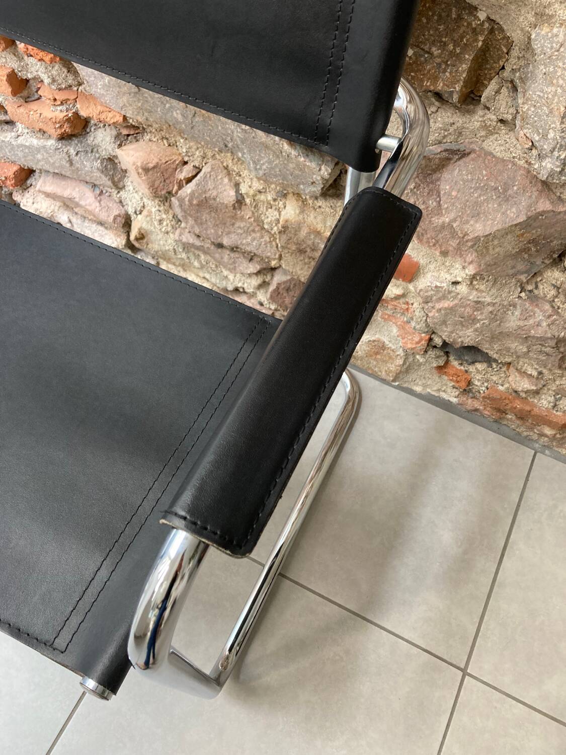 Chrome and black leather armchair type B34