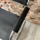 Chrome and black leather armchair type B34