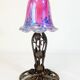 Lampe art deco en fer forgé et tulipe en verre moucheté