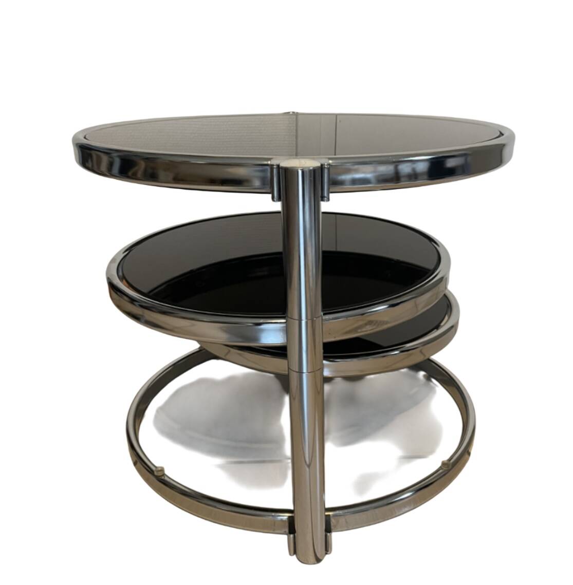Coffee table with 3 chrome and smoked glass tops.