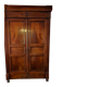 Directoire period wardrobe in solid walnut.