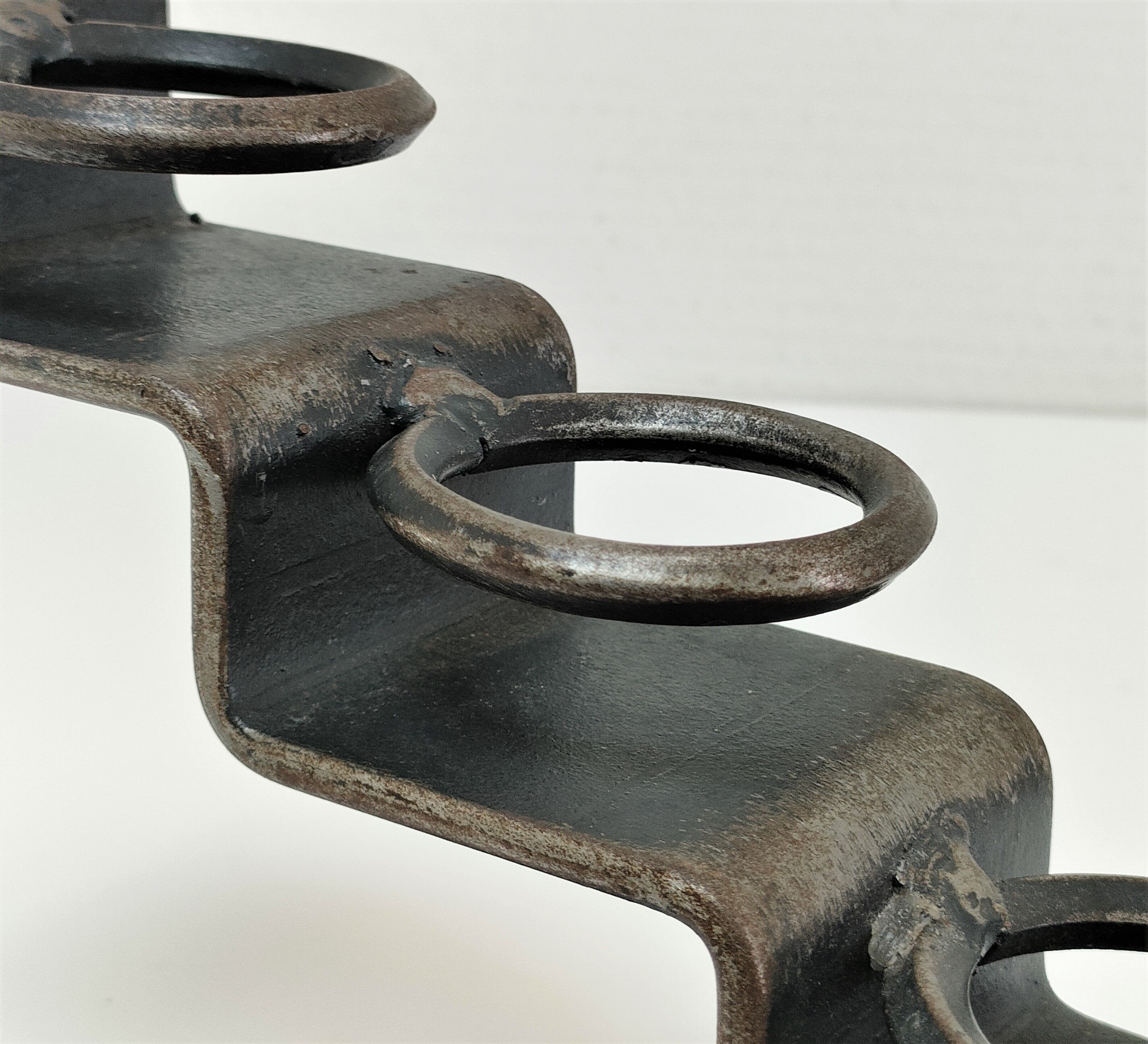 Sculptural candle holder patinated steel design 80s