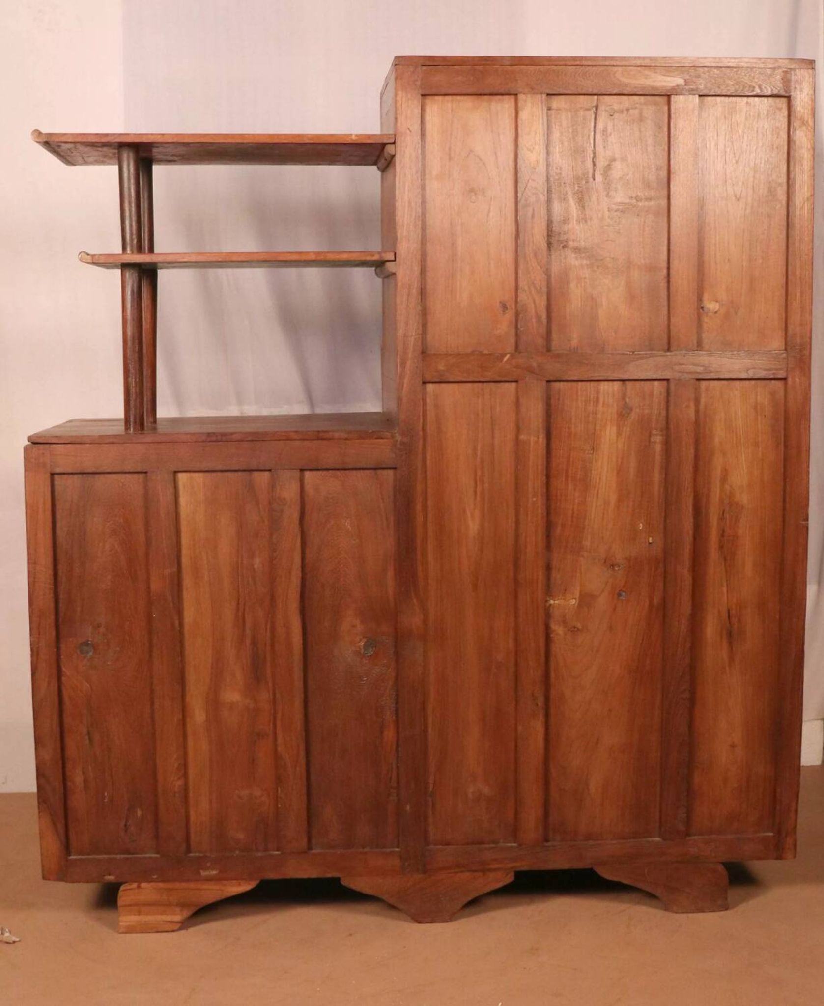 Antique Art Deco display cabinet in Burmese teak with original yellow patina interior.