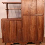 Antique Art Deco display cabinet in Burmese teak with original yellow patina interior.