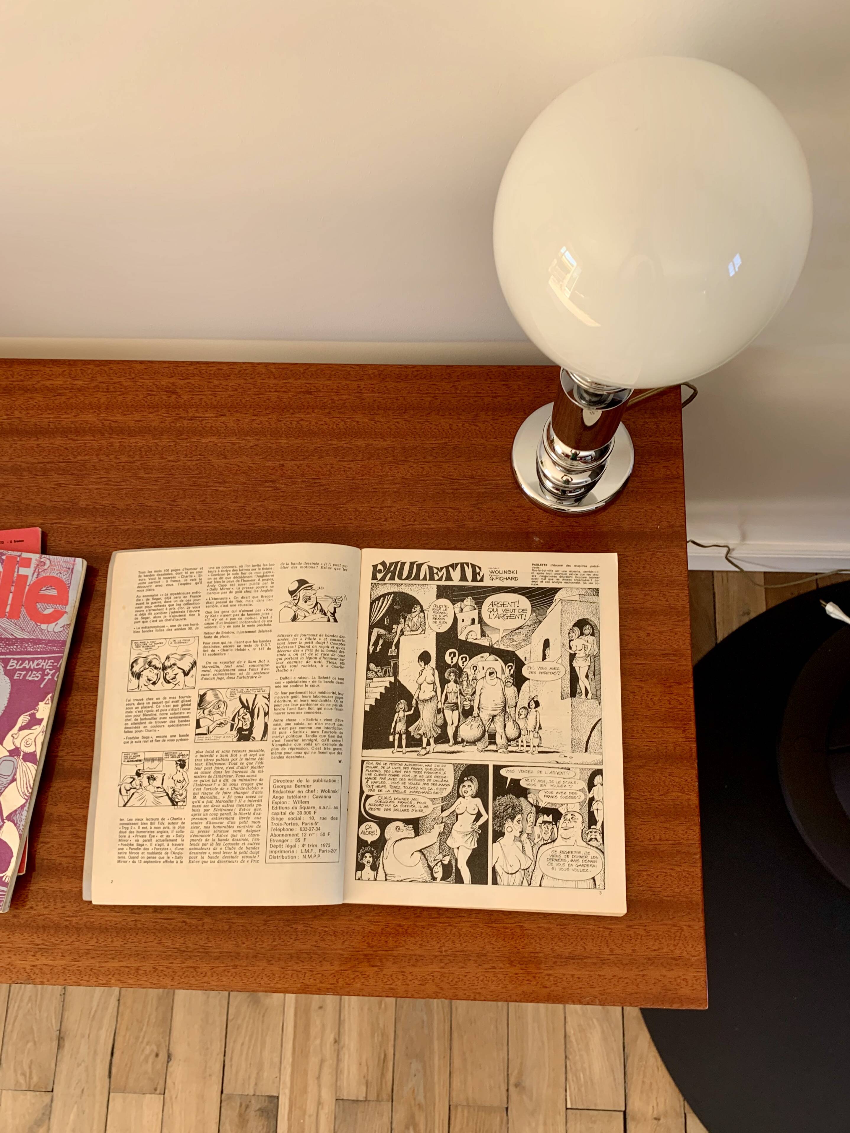 lacquered wood desk and black steel legs design from the 60s and 70s