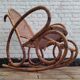 Vintage rocking chair in rattan and cane.