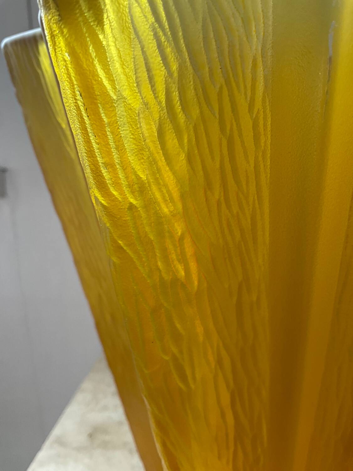 Art Deco star vase in yellow glass from the 1950s