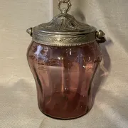 Purple glass biscuit barrel with painted gold arabesque decorations for cakes.