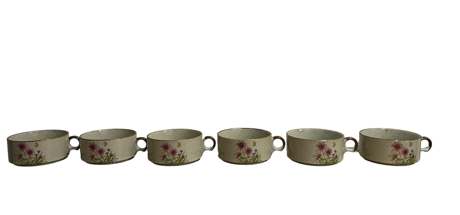 Six ceramic floral cups