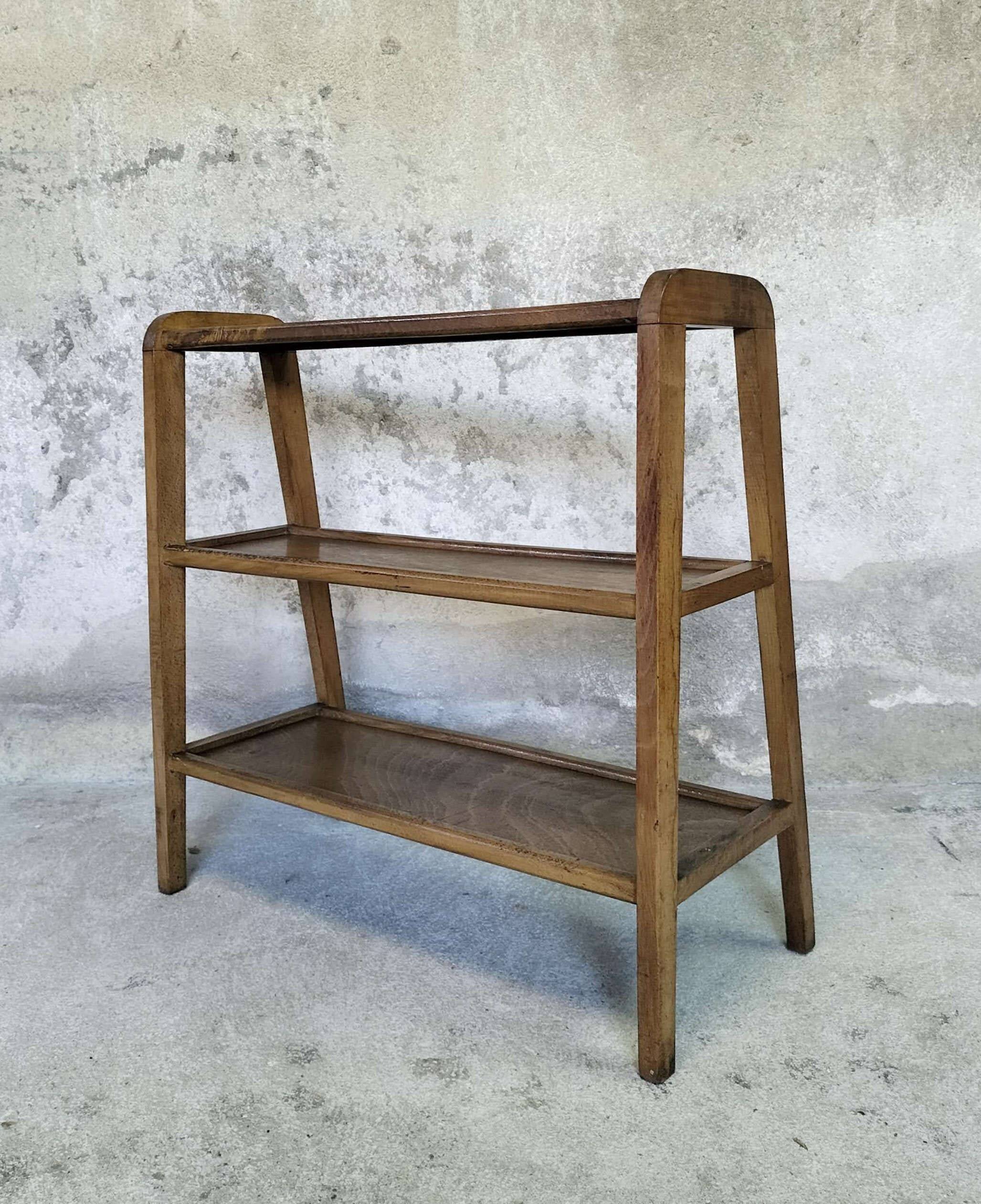 Vintage shelf on wooden legs in wood