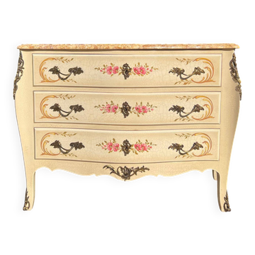 Curved Louis XV style commode in marble with painted floral decoration.