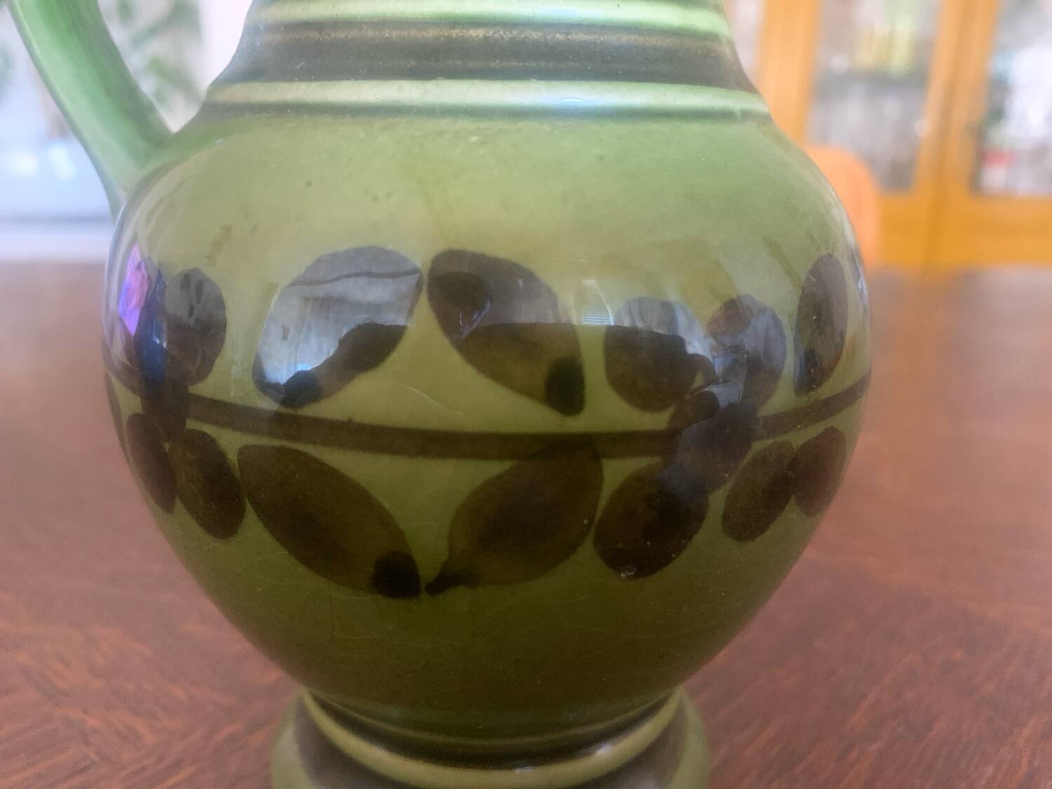Green ceramic jug