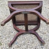 Cross-footed cane stool