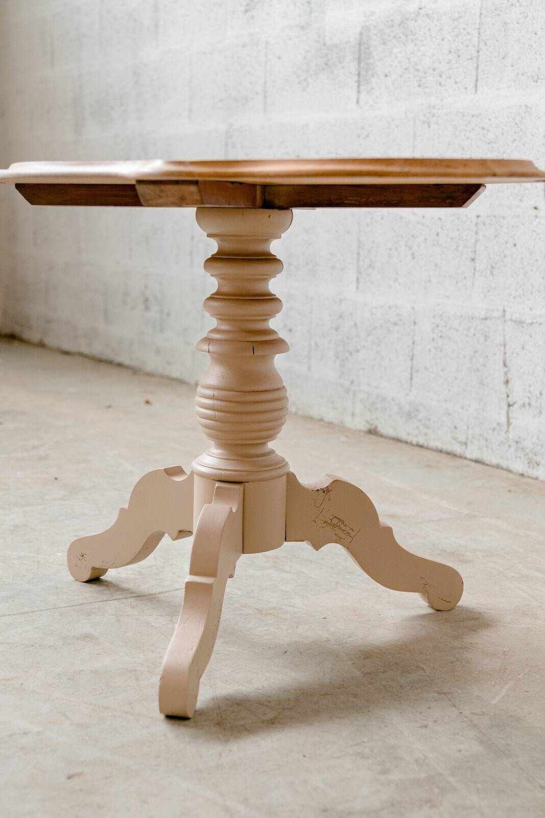 Old wooden pedestal table