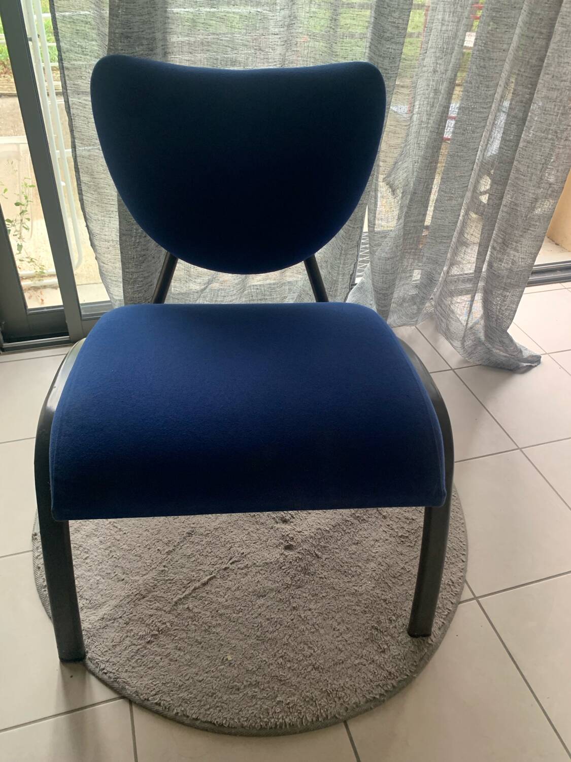 Black metal design armchair with blue fabric. 1980s.