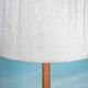 Vintage Swedish wooden floor lamp with pleated shade from the 1960s.