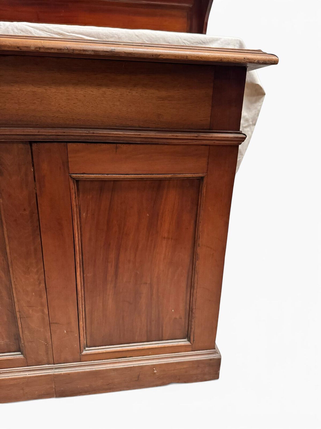 Oak desk with 9 drawers and leather writing pad.