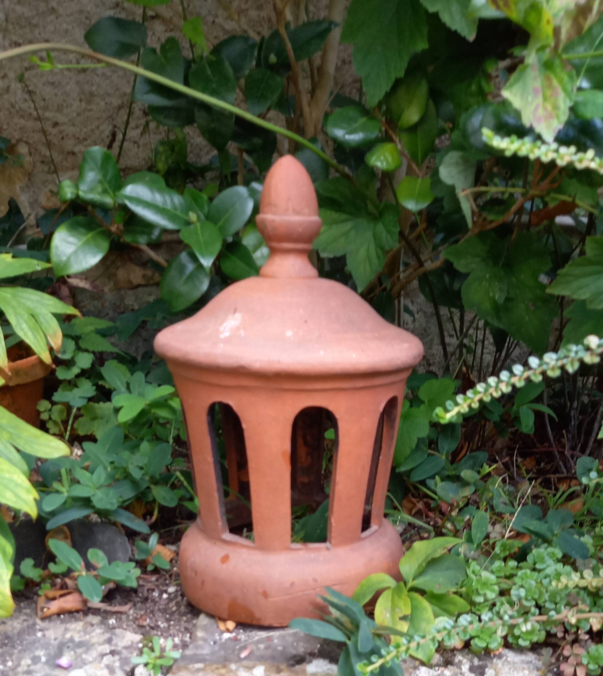 Chimney bolster and garden decoration roof