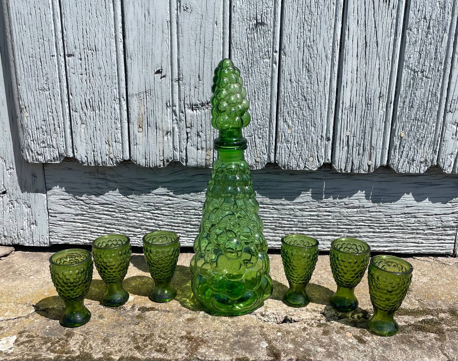 Liqueur service coloured glass empoli, vintage green carafe