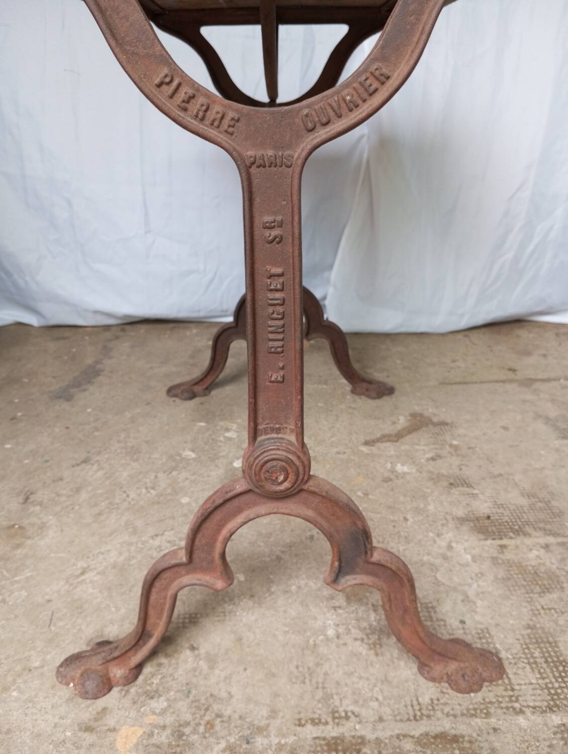 Antique bistro table with lion paws