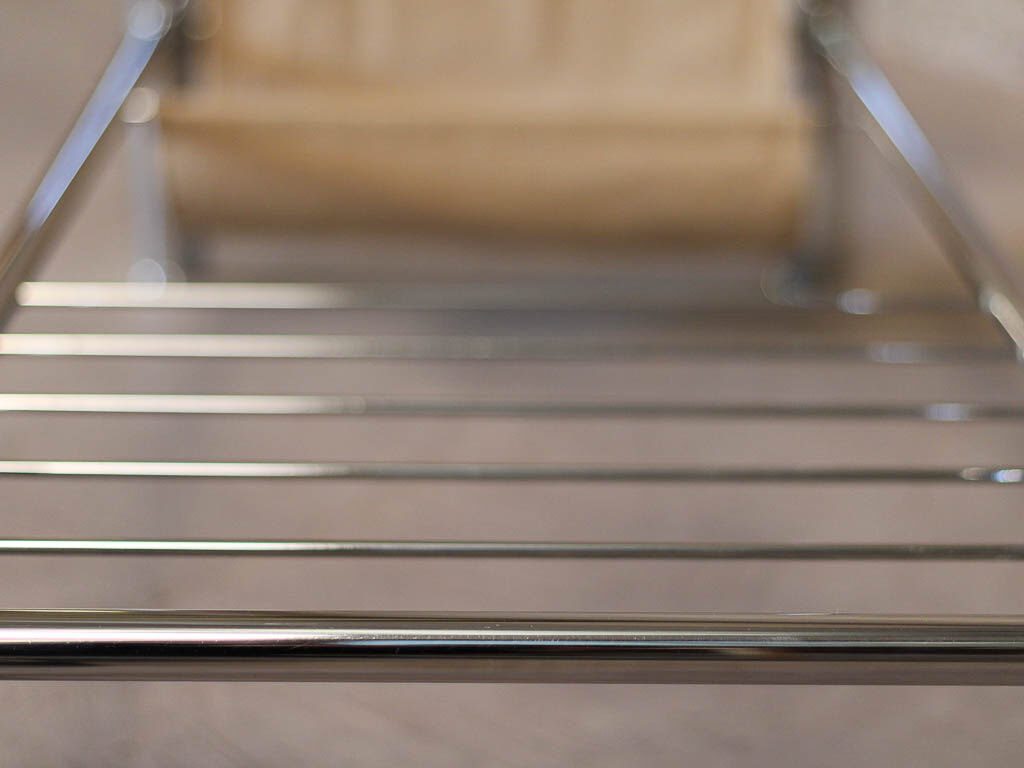 Glass rectangle coffee table with magazine rack, circa 1970