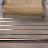 Glass rectangle coffee table with magazine rack, circa 1970