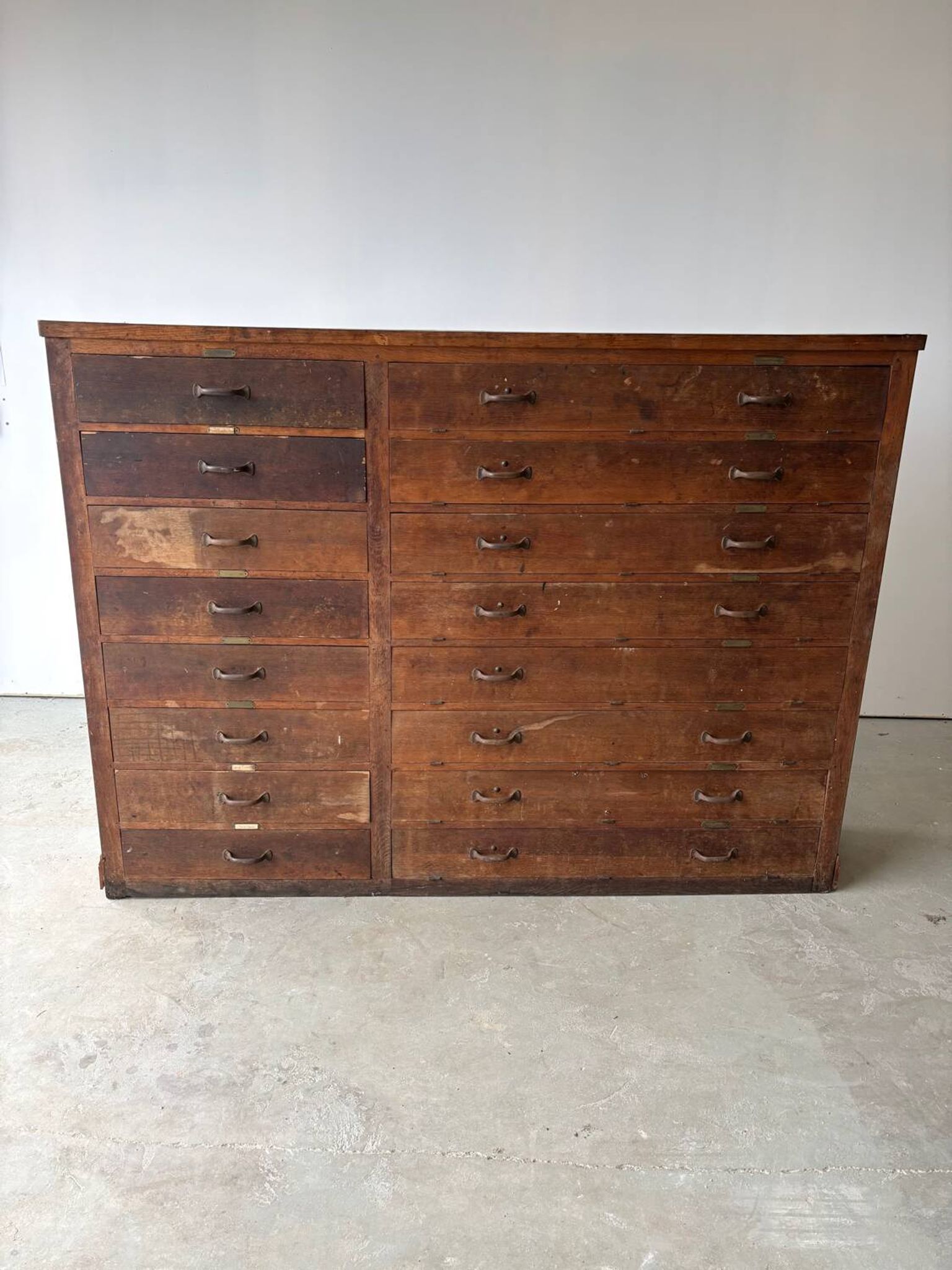 Large wooden workshop cabinet with 16 drawers, antique from the early 1900s.