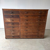 Large wooden workshop cabinet with 16 drawers, antique from the early 1900s.