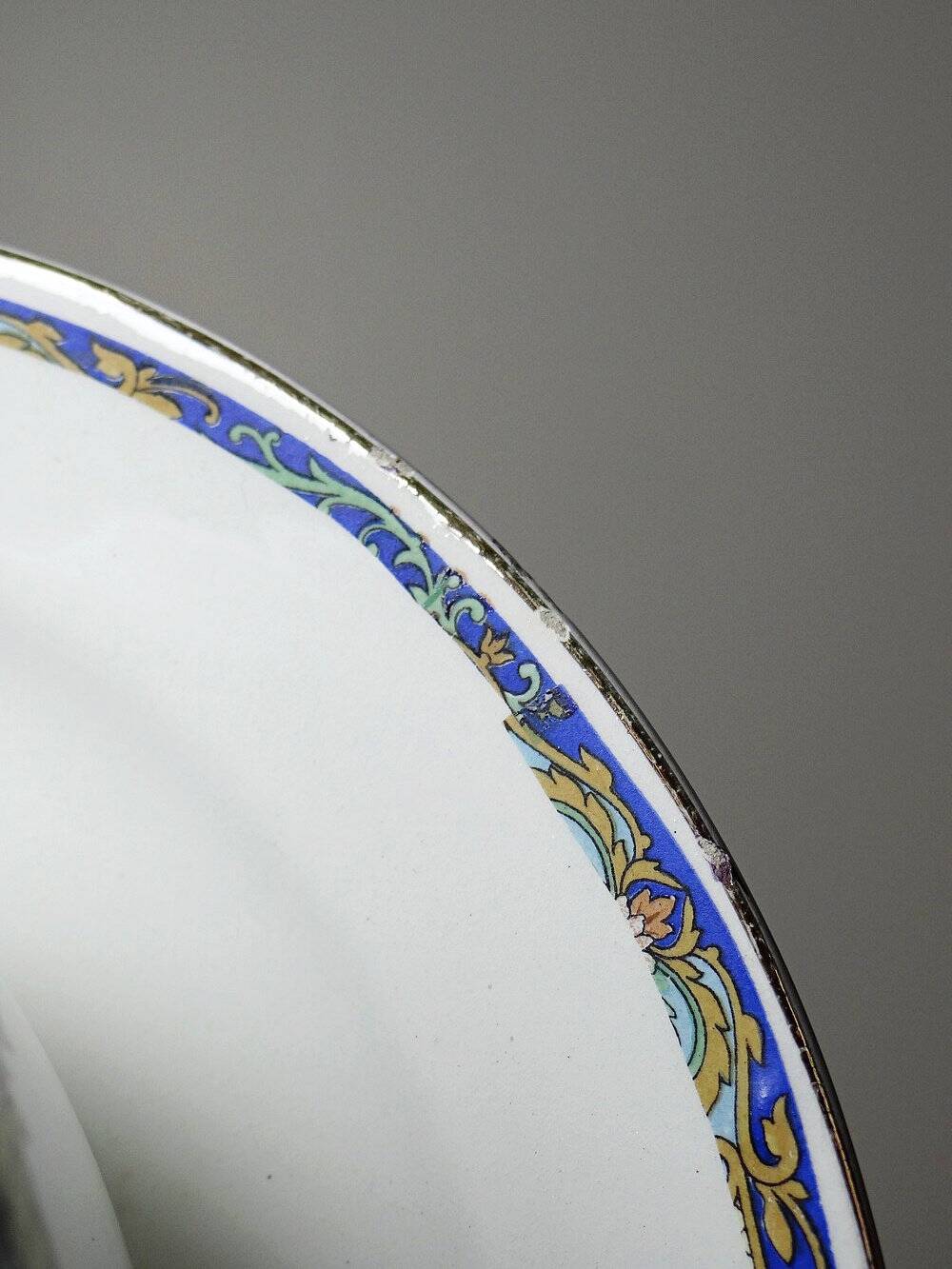 Old Luneville sauce boat, opaque porcelain with polychrome decoration.