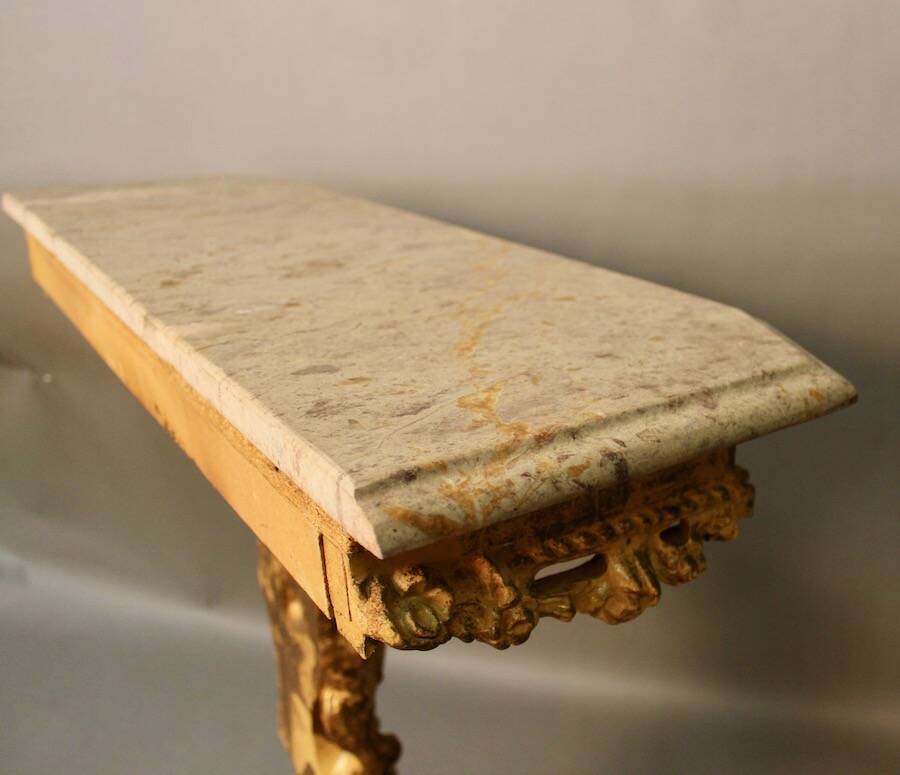 Marble top console and its rocaille style mirror