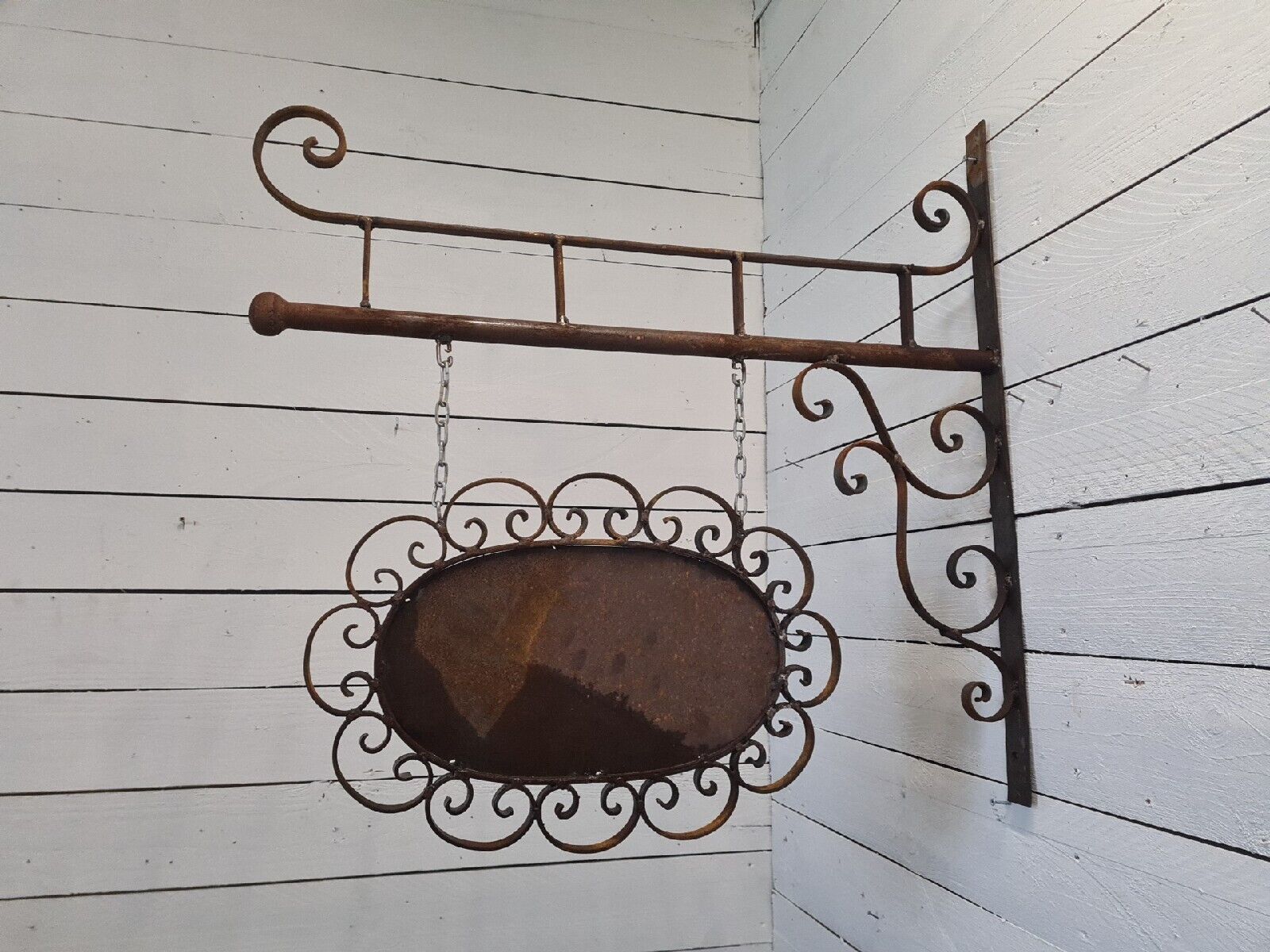 Wrought iron trade sign