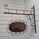 Wrought iron trade sign