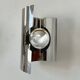 Pair of vintage wall lights, curved chrome metal, France, 1970.