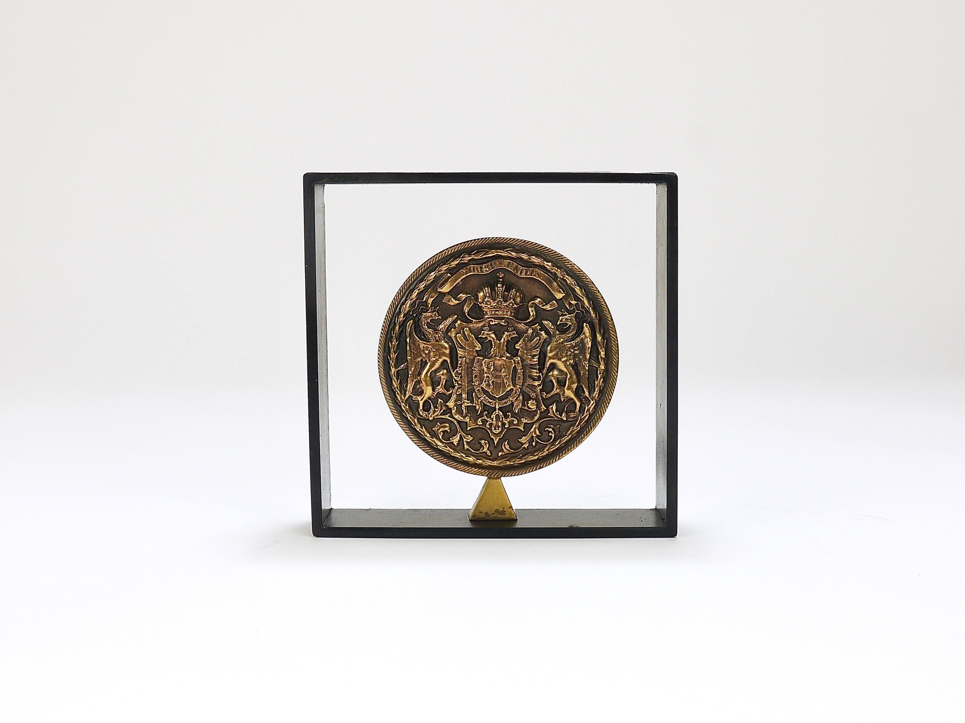 Iron and brass medal Carl Aubock bookends mid-century, Austria, 1970s