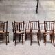 Series of 7 old bar cane cane bistro chairs