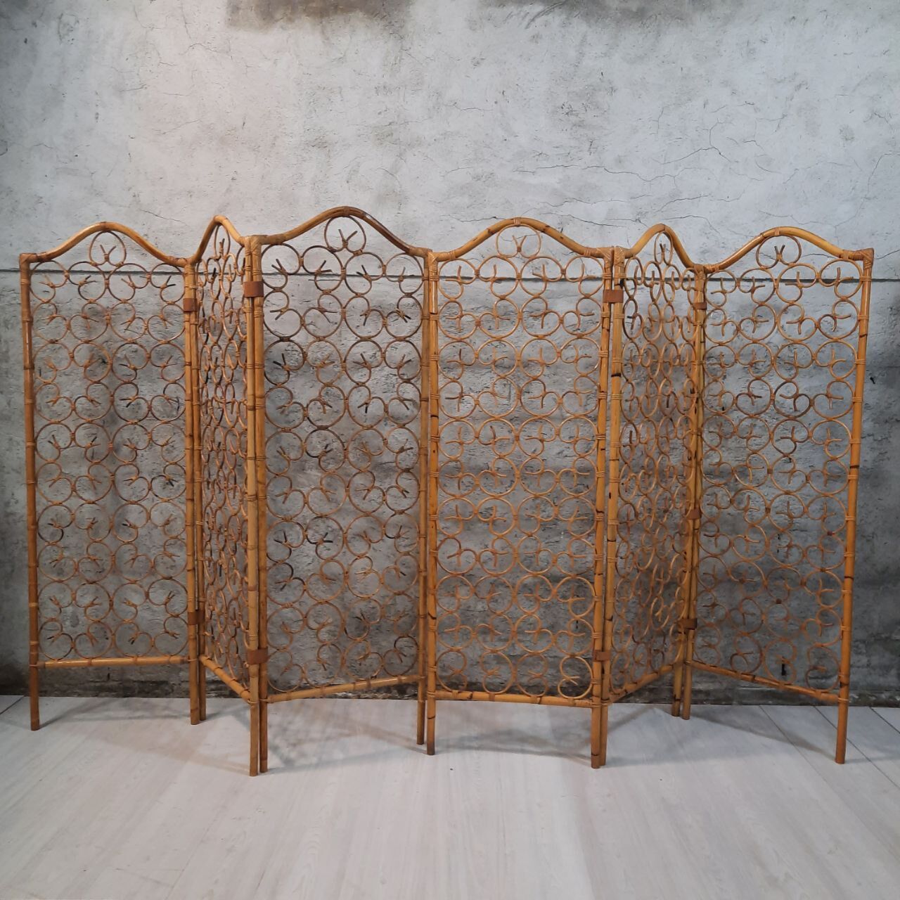 Vintage screen made of bamboo, wicker and leather