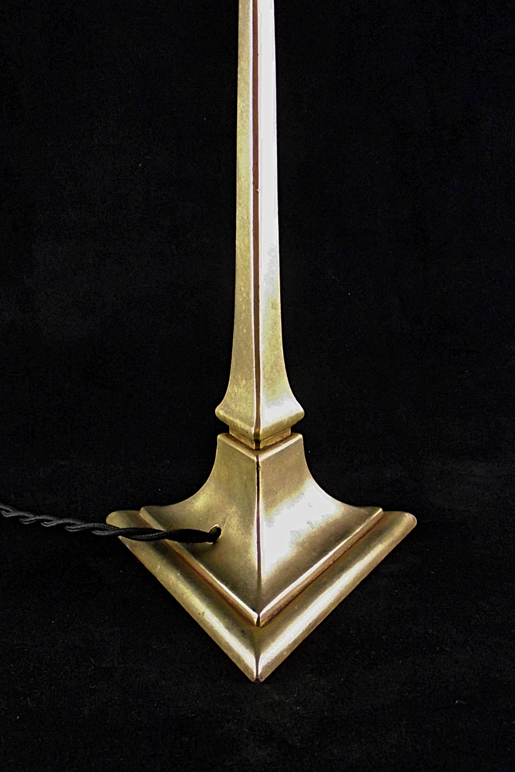 Art deco lamp signed degue with a bronze base.