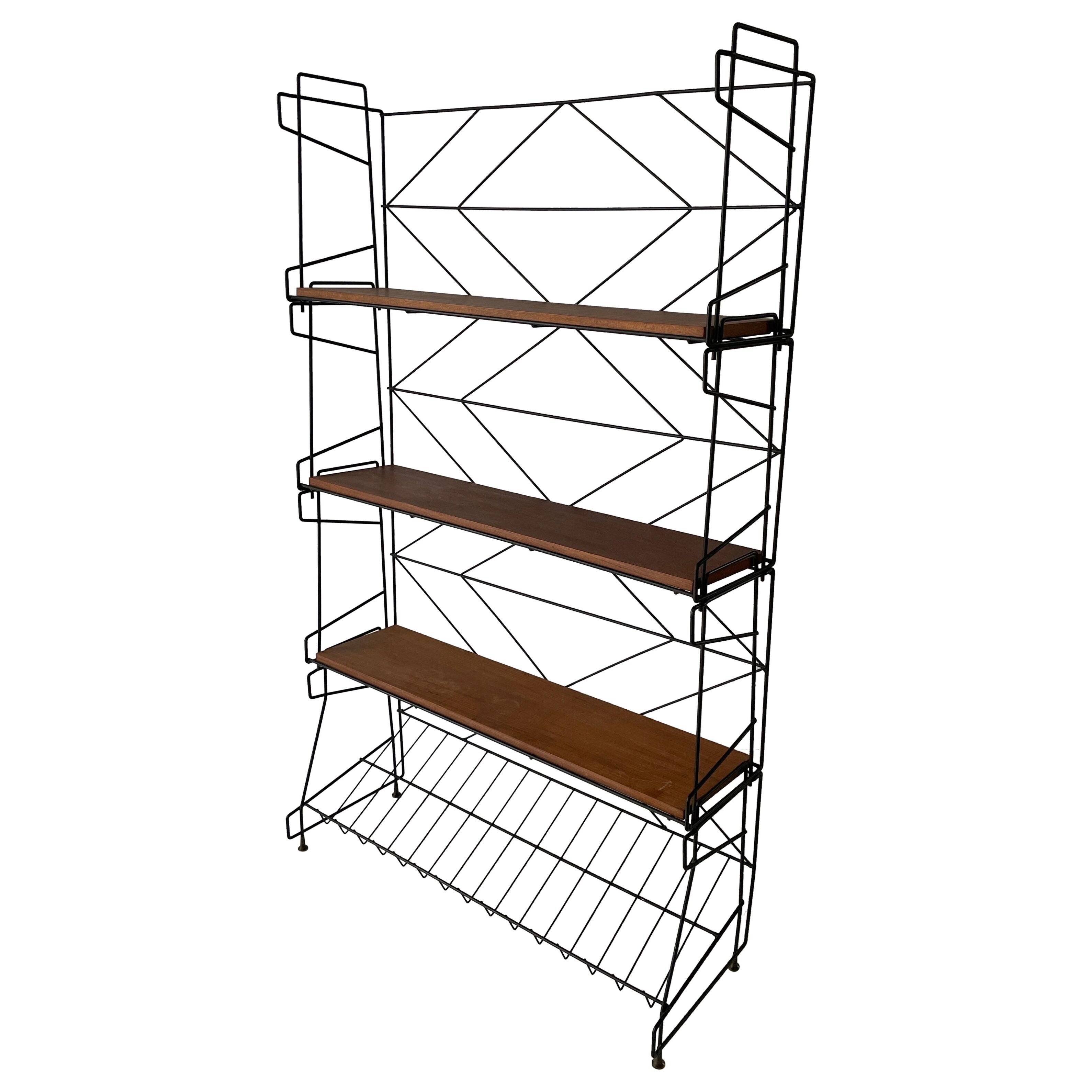 Free-standing shelf with a metal structure and 3 shelves, 1960s, Italy.