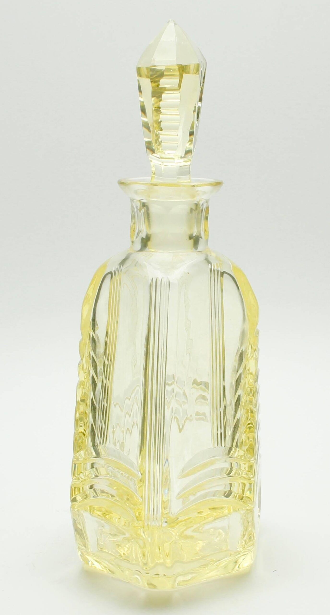 Matching pair of bohemian crystal decanters with art deco motifs