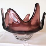 Crystal vase in the shape of a jellyfish, eggplant color with a gradient background