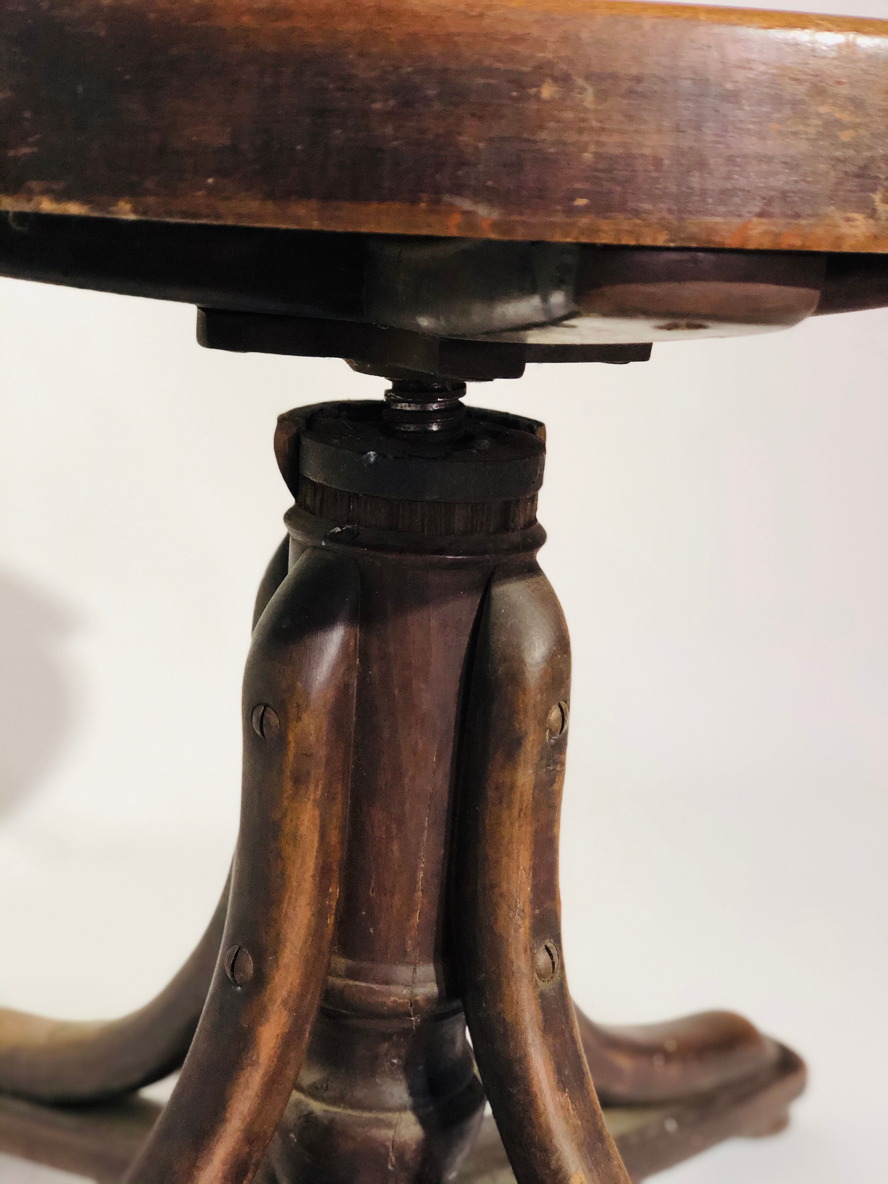 Swivel wooden armchair