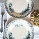 Mismatched antique flat plates made of ironstone pottery.